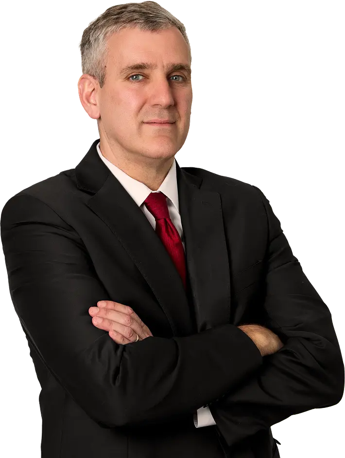 Attorney Michael E. Skiber in a dark suit with arms crossed