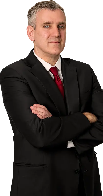 Attorney Michael E. Skiber in a dark suit with arms crossed