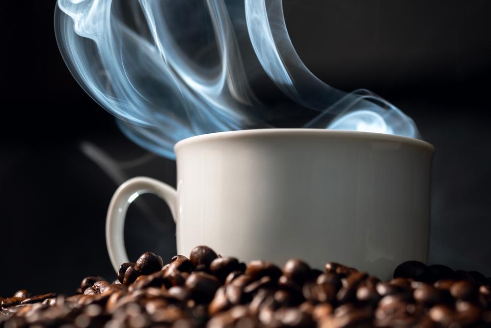 A steaming cup of coffee. Find out if a lawyer can help if spilled coffee burned you. 