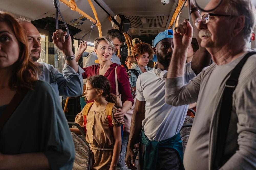 A group of people on a bus. Find out what to do if you get in a bus accident in Stamford from our team at Skiber Law.